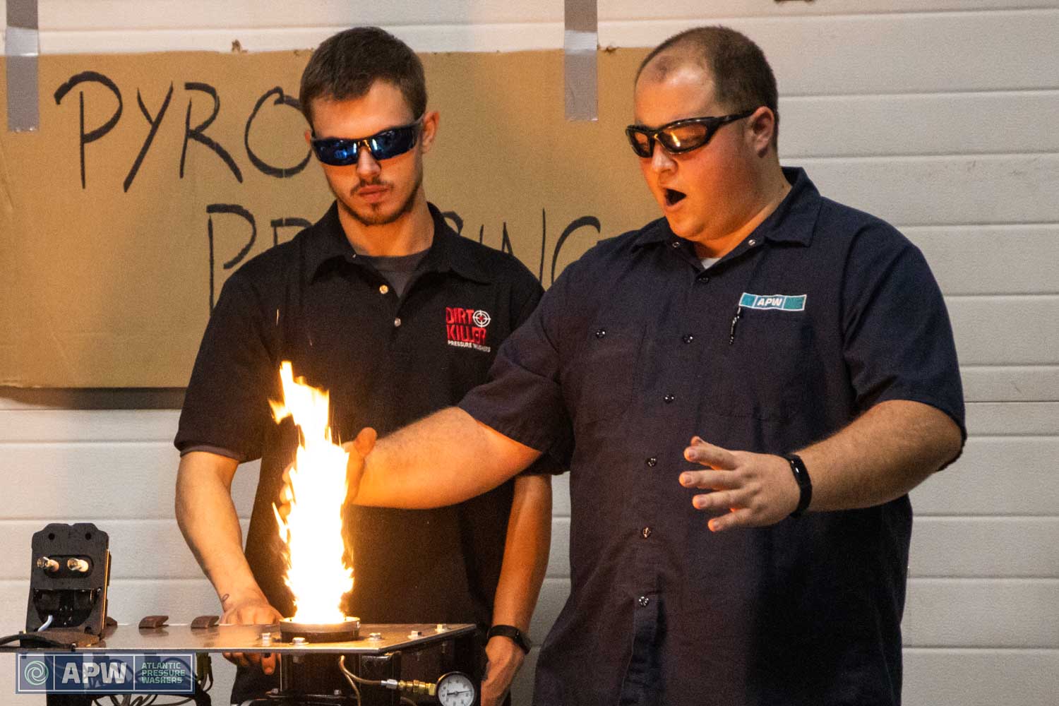 Andrei and Wags demonstrating hot water pressure washer flame